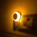 Modern orange circular led night light for bedroom smart sensor by Decorbites