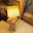 Whimsical beige and yellow ceramic pleats table lamp for bedroom by Decorbites