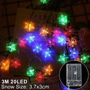 Warm white led snowflake christmas lights living room decor by Decorbites
