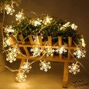 Warm white led snowflake christmas lights living room decor by Decorbites
