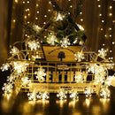 Warm white led snowflake christmas lights living room decor by Decorbites