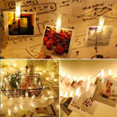 Warm white led string lights with photo clips bedroom decor by Decorbites