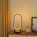 Modern gold oval led bedside decorative lamp for bedroom by Decorbites