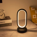 Modern gold oval led bedside decorative lamp for bedroom by Decorbites