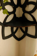 Modern black metal lotus floating wall shelf living room decor by Decorbites