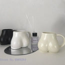 Playful white speckled butt shape ceramic coffee cup kitchen decor by Decorbites