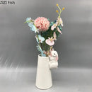 White rabbit ceramic vase with bunny figurine bedroom table decor by Decorbites