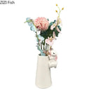 White rabbit ceramic vase with bunny figurine bedroom table decor by Decorbites