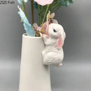 White rabbit ceramic vase with bunny figurine bedroom table decor by Decorbites