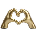 Glossy gold silver & black gesture heart sculpture living room decor by Decorbites
