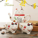 White lucky cat porcelain tea set kitchen ceramic teapot and cups by Decorbites