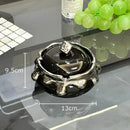 Modern black & white ceramic ashtray with silver drip – living room decor by Decorbites
