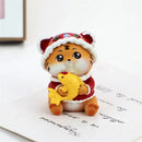 Lucky tiger figurine yellow living room new year decor holding gold bars by Decorbites