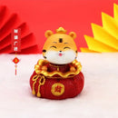 Lucky tiger figurine yellow living room new year decor holding gold bars by Decorbites