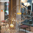 GobekUsa Minimal Brass Bubble Pendant Light with 5 Clear Glass Heads