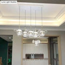 GobekUsa Minimal Brass Bubble Pendant Light with 5 Clear Glass Heads