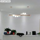 GobekUsa Minimalist Cream Glass LED Pendant Light for Restaurants - Ball Island Ceiling Light with Wood Accent