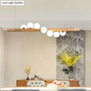 GobekUsa Minimalist Cream Glass LED Pendant Light for Restaurants - Ball Island Ceiling Light with Wood Accent