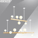 GobekUsa Minimalist Wood Island Pendant Light with Opal Glass Balls - perfect for Restaurants