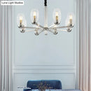 GobekUsa Modern 6-Head Clear Glass Candle Chandelier: Chrome Ceiling Pendant Fixture with Adjustable Chain