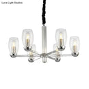 GobekUsa Modern 6-Head Clear Glass Candle Chandelier: Chrome Ceiling Pendant Fixture with Adjustable Chain