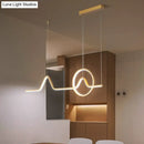 GobekUsa Modern Black/Gold Aluminum Linear LED Island Lighting with Sun and Mountain Design - Warm/White Light
