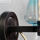 GobekUsa Modern Blue Glass Wall Sconce with Tapered Shade & 1 Light - Perfect for Your Bedroom!