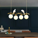 GobekUsa Modern Branch Island Pendant Light with Ball Glass Shade and Bird Deco - Metal 4-Light Fixture for Dining Room