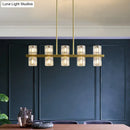 GobekUsa Modern Golden Cylindrical Crystal Pendant Light with 10/20 Island Lights for Dining Tables