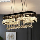 GobekUsa Modern LED Crystal Pendant Light with Stainless Steel Frame and Tassel Accents