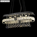 GobekUsa Modern LED Crystal Pendant Light with Stainless Steel Frame and Tassel Accents