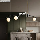 GobekUsa Modern Mini Milk Glass Island Lamp with Bird Decoration - 3-Head suspension pendant in Black-Brass