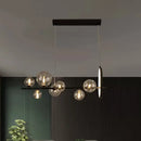 GobekUsa Modernist 7-Bulb Glass Island Light for Restaurants - Hanging Pendant with Transparent Ball Shades and Black Finish