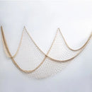 Nautical theme beige & navy blue fishing net wall decor living room by Decorbites