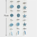 Nautical theme beige & navy blue fishing net wall decor living room by Decorbites