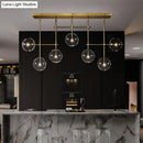GobekUsa Nordic Clear Glass 7-Bulb Black/Gold Sphere Island Pendant Light for Living Room