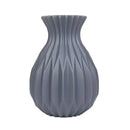 Glossy ribbed plastic flower vase set for living room decor by Decorbites