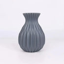 Glossy ribbed plastic flower vase set for living room decor by Decorbites