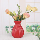 Glossy ribbed plastic flower vase set for living room decor by Decorbites