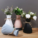 Origami style pink blue and white plastic flower vase living room by Decorbites