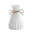 Origami style pink blue and white plastic flower vase living room by Decorbites