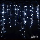 Warm golden outdoor christmas waterfall lights outdoor curtain string by Decorbites