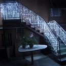 Warm golden outdoor christmas waterfall lights outdoor curtain string by Decorbites