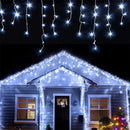 Warm golden outdoor christmas waterfall lights outdoor curtain string by Decorbites
