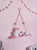 Boho pink green wooden macrame hanging shelf for kids room by Decorbites