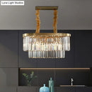 GobekUsa Postmodern Clear Crystal Rod Pendant Light for Dining Room in Brass Finish