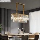 GobekUsa Postmodern Clear Crystal Rod Pendant Light for Dining Room in Brass Finish