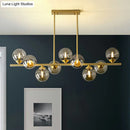GobekUsa Postmodern Gold Finish Amber Glass Ball Island Hanging Lamp for Table Illumination