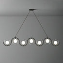 GobekUsa Postmodern Island Light Fixture: Wavy Metallic Hanging Lamp with Glass Shade