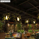 GobekUsa Retro Metal Bicycle Restaurant Ceiling Light with 2 Black Drop Lamp Heads and Plant Decor